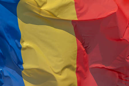Part of Romanian national flag waving, close-up. Romania, RO