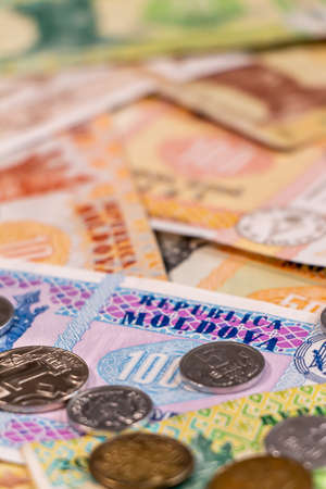 A composition of Moldovan leu. MDL banknotes and coins providing great options to be used for...