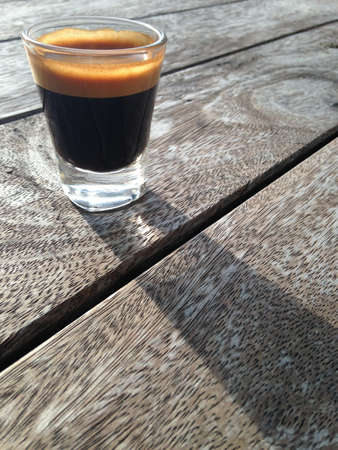 Espresso shot in the morning to start a working day.の写真素材