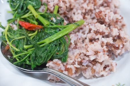 Food for Health Fried morning glory with Coarse riceの写真素材
