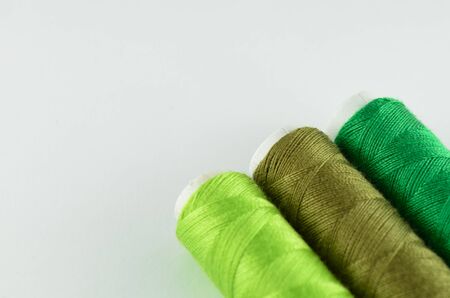 Green yarn on white background
