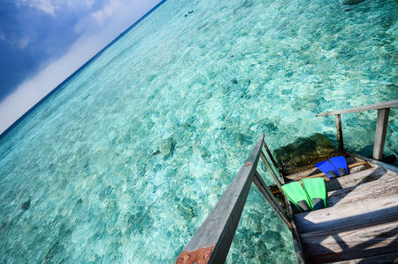 Rubber flippers at the seaの写真素材