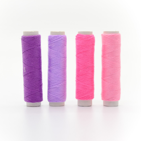 Set of colorful spools of thread