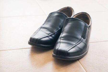 black man shoes on the tilesの写真素材