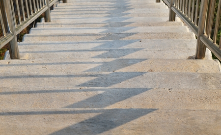 Detail top view of shadow on cement stairの写真素材