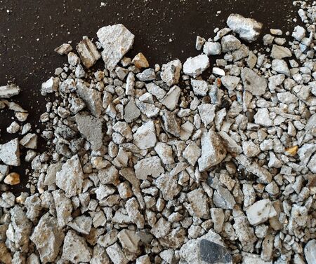 scrap stone and scap cement on dirty groundの写真素材