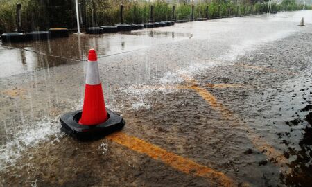 detail traffic cone in raining for backgroundの写真素材