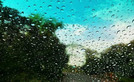 Detail rain water drop on windshield in rainy dayの写真素材