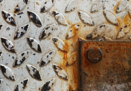surface of white paint on steel and rusty steel after used for a long timeの写真素材