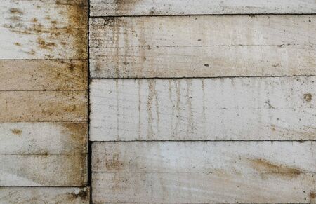 broken white wall brick for backgroundの写真素材