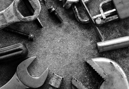 many tool on cement ground in black and white photography