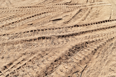 tire track of many vehicle on soil dust road in countrysideの写真素材
