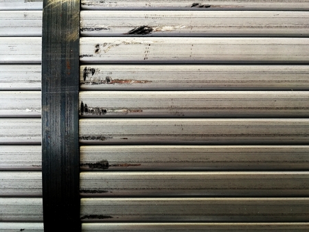 metal tube and metal belt for backgroundの写真素材