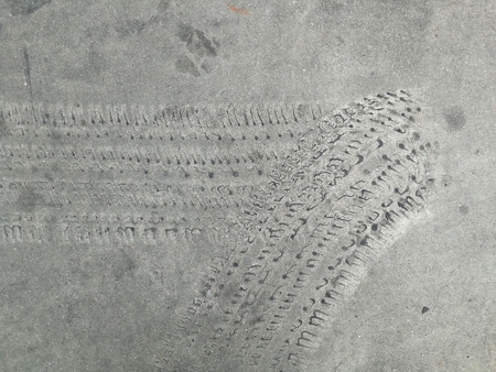 tire track of forklift on cement floorの写真素材