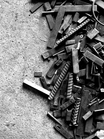 many old steel on dirty ground in black and white photographyの写真素材