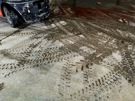 tire track of forklift on dirty groundの写真素材