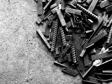 many old steel on dirty ground in black and white photographyの写真素材