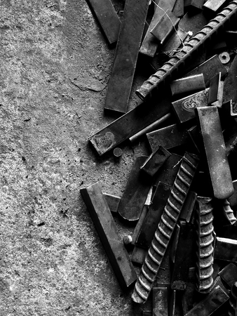 many old steel on dirty ground in black and white photographyの写真素材