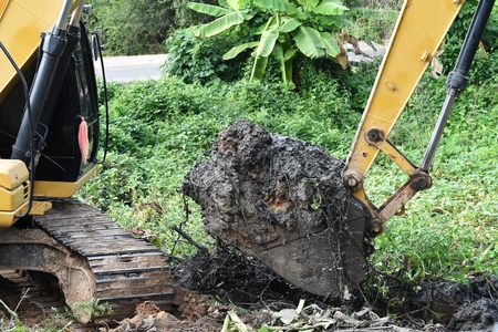backhoe dig groundの写真素材