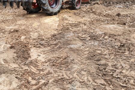 lots tire track on dirty soil ground for abstract background