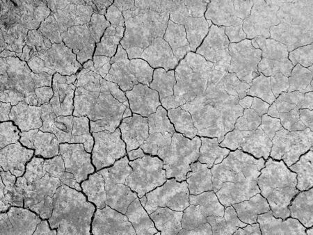 high angle view of crack soil ground in black and white photographyの写真素材