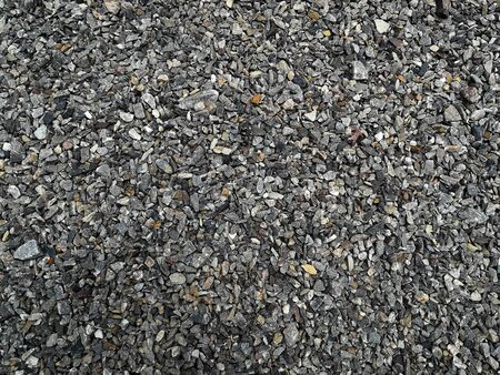 lots stone  on ground for backgroundの写真素材