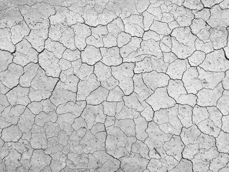 high angle view of crack soil ground in black and white photographyの写真素材