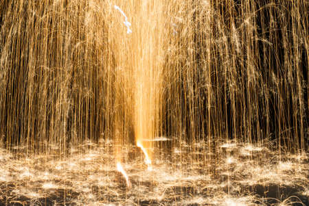 fireworks lighting the night sky in different colorsの写真素材