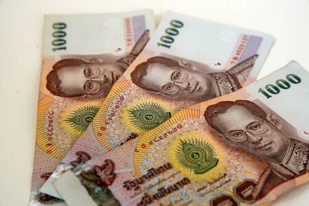 Few coins and banknotes of Thailand Kingdom (Thai Baht, THB)の写真素材