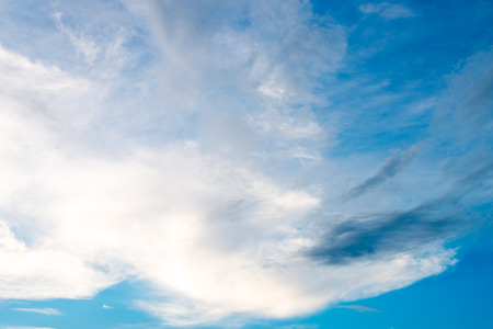 White Sky and Puffy Cloudsの写真素材