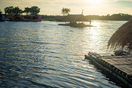 bamboo rafting travel in thailand.sunsetの写真素材
