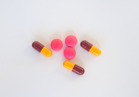 Tablets pills capsule heap mix therapy drugs doctor flu antibiotic pharmacy medicine medicalの写真素材