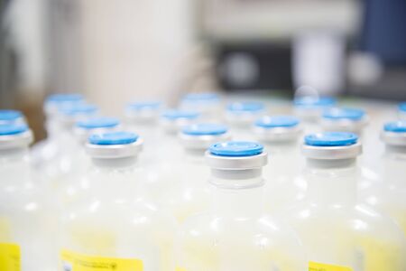 Blurred 0.9% Normal saline bottleの写真素材