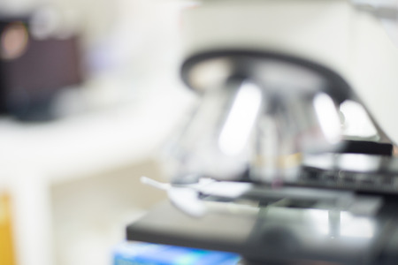 Blurred microscopelaboratory in medical concept.