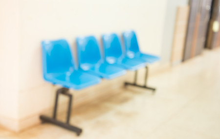 Blurred row of chairs in a waiting room hospital.の写真素材