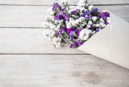 dried statice flowers on wood ,nostalgic still life ,