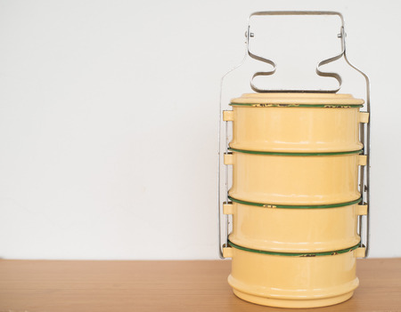 Yellow metal Tiffin,thai food carrier.vintage toneの写真素材