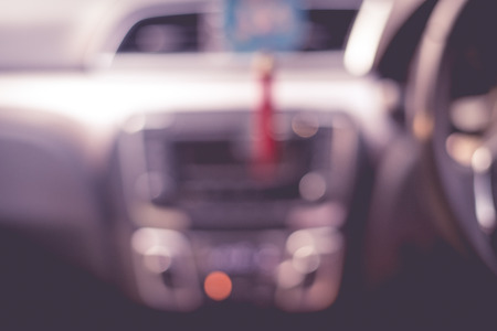 Blurred car Interior in pink tone.の写真素材