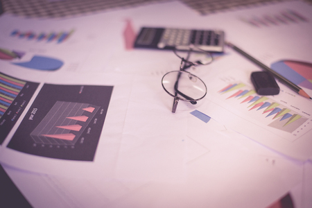 Blurred business work space in pink tone.の写真素材