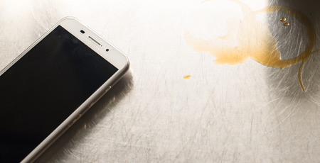 soft focus smart phone social media and coffee time.の写真素材