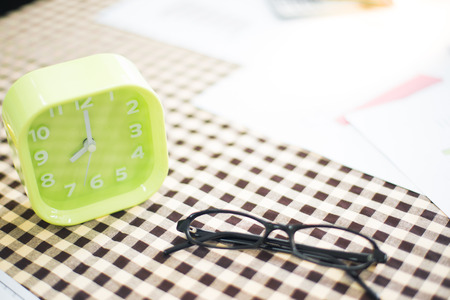 Glass with clock in exam concept.の写真素材