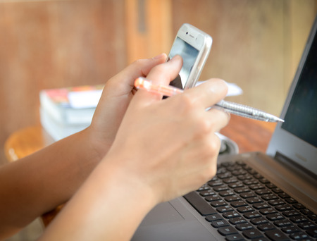 hand using phoneの写真素材