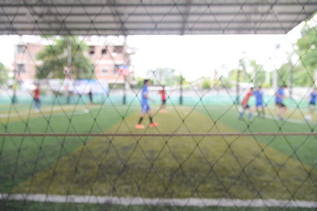 blurred soccer player