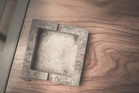 ashtray on wood table.の写真素材