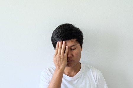 Young Asian human close up on whiteの写真素材