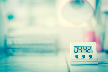 Timer in laboratoey over white tone.の写真素材