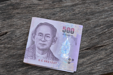 Thai banknote on wood.500 bath