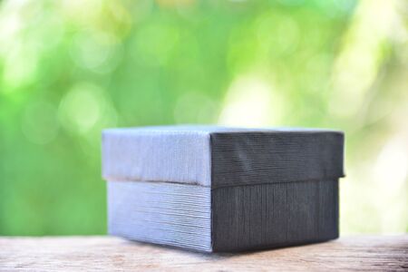 Black box on green nature backgroundの写真素材