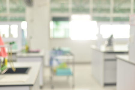 blurred sterio microscope in biology laboratory in whiteの写真素材