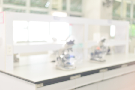 blurred sterio microscope in biology laboratory in whiteの写真素材